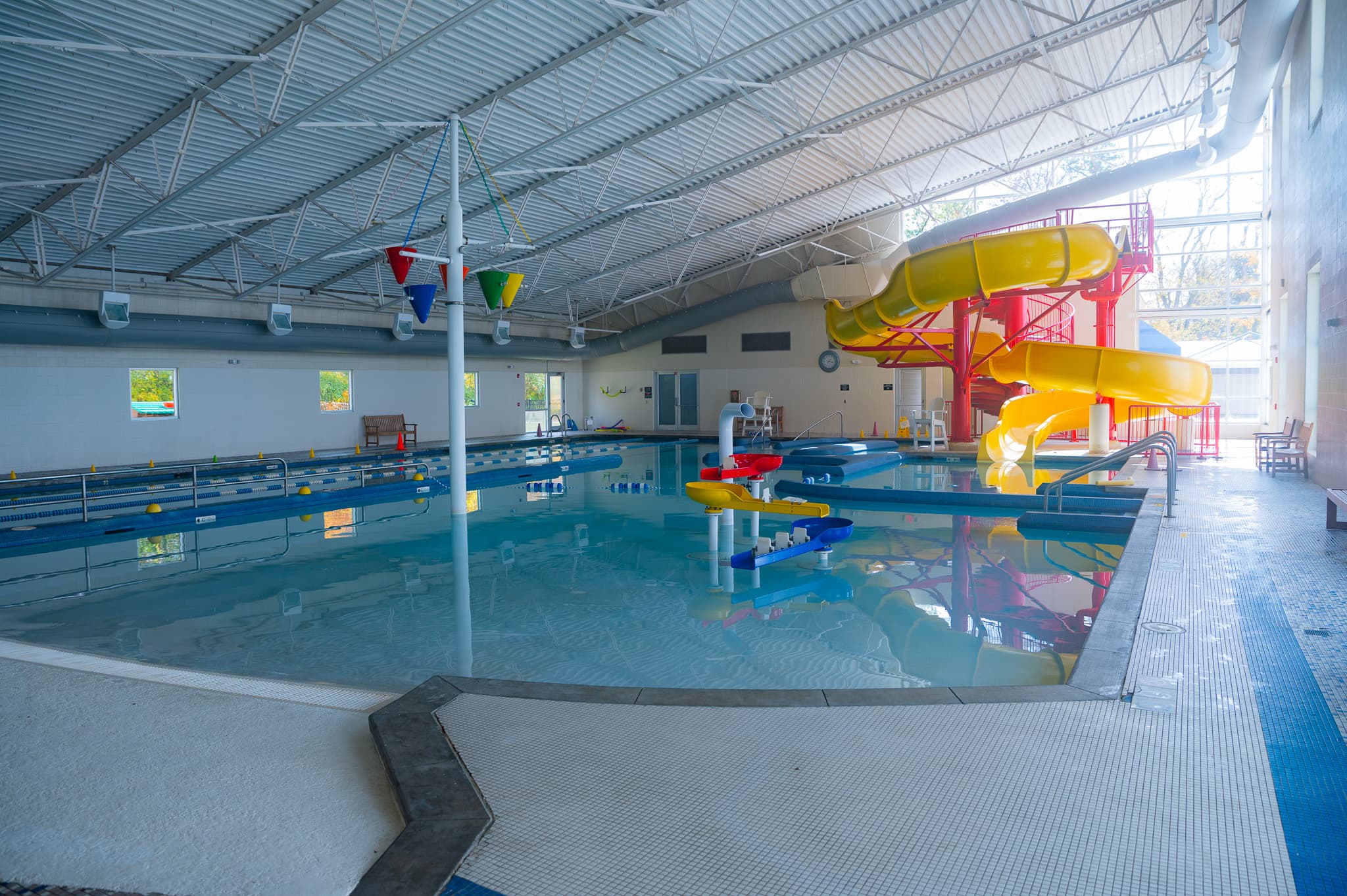 An indoor water park with a spiral slide.